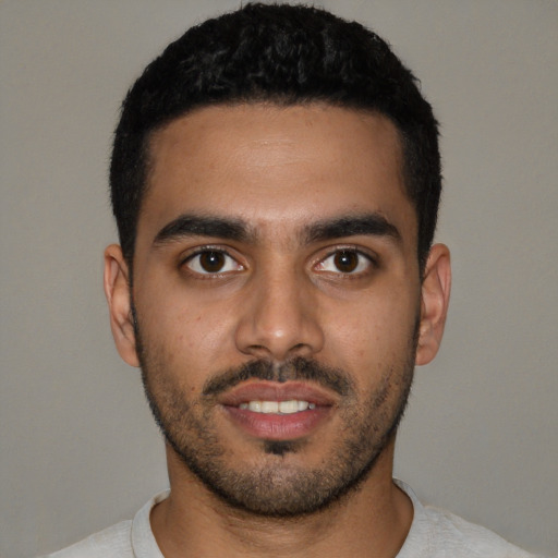 Neutral latino young-adult male with short  black hair and brown eyes