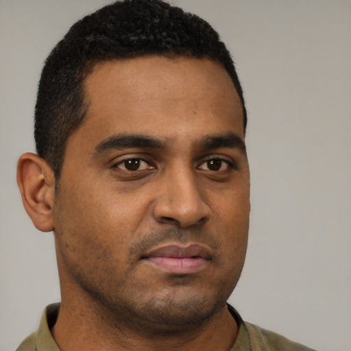 Neutral black young-adult male with short  brown hair and brown eyes