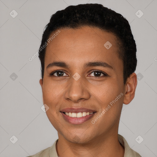 Joyful latino young-adult female with short  black hair and brown eyes