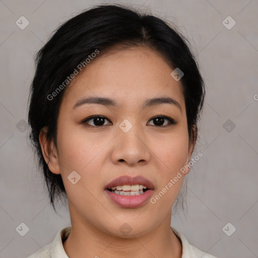 Joyful asian young-adult female with medium  black hair and brown eyes