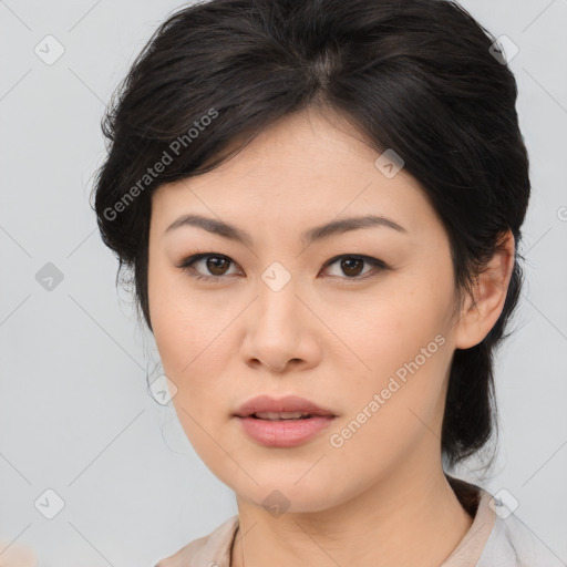 Joyful asian young-adult female with medium  brown hair and brown eyes