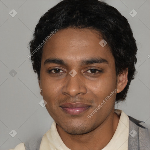 Joyful black young-adult male with short  black hair and brown eyes