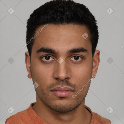 Neutral latino young-adult male with short  black hair and brown eyes