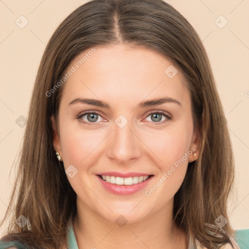 Joyful white young-adult female with medium  brown hair and green eyes