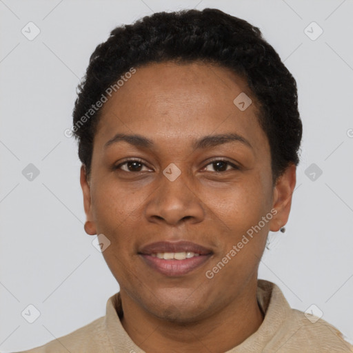 Joyful black adult female with short  black hair and brown eyes