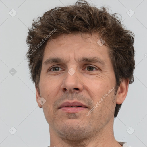 Neutral white adult male with short  brown hair and brown eyes