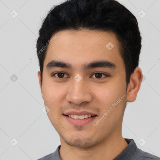 Joyful latino young-adult male with short  black hair and brown eyes