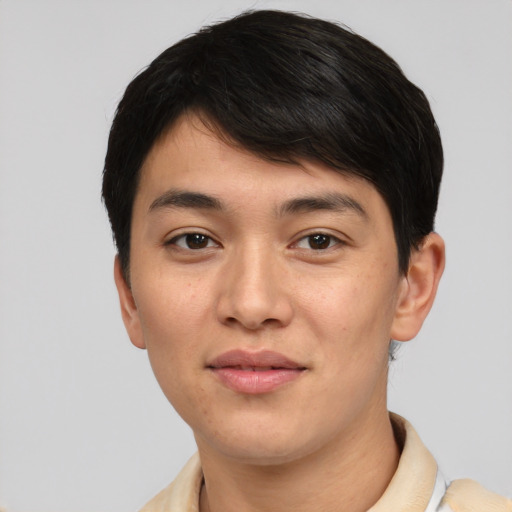 Joyful asian young-adult male with short  black hair and brown eyes