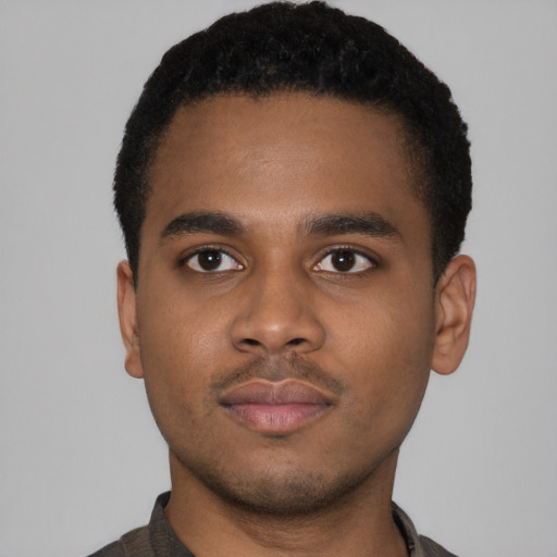 Neutral latino young-adult male with short  brown hair and brown eyes