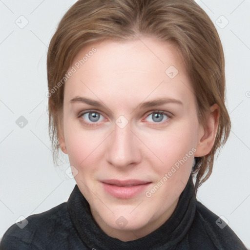 Joyful white young-adult female with medium  brown hair and blue eyes