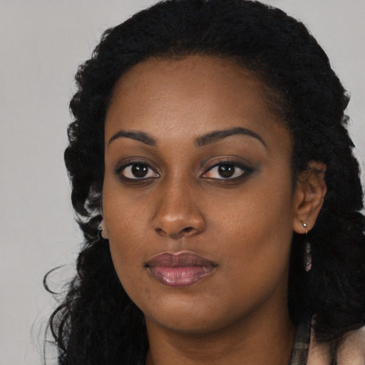 Neutral black young-adult female with long  black hair and brown eyes