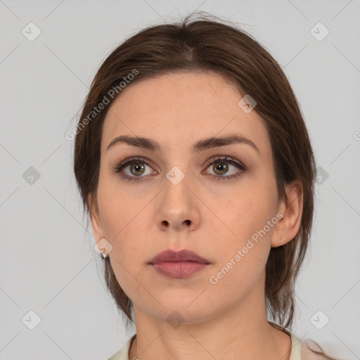 Neutral white young-adult female with medium  brown hair and brown eyes