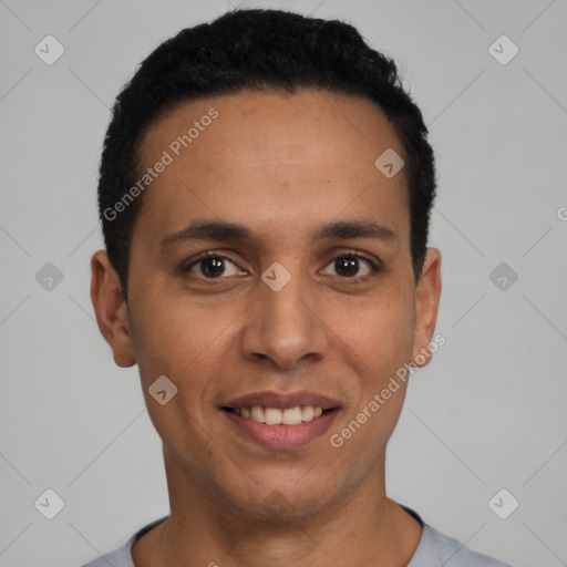 Joyful latino young-adult male with short  black hair and brown eyes