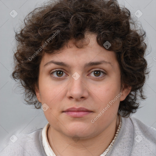 Joyful white child female with medium  brown hair and brown eyes