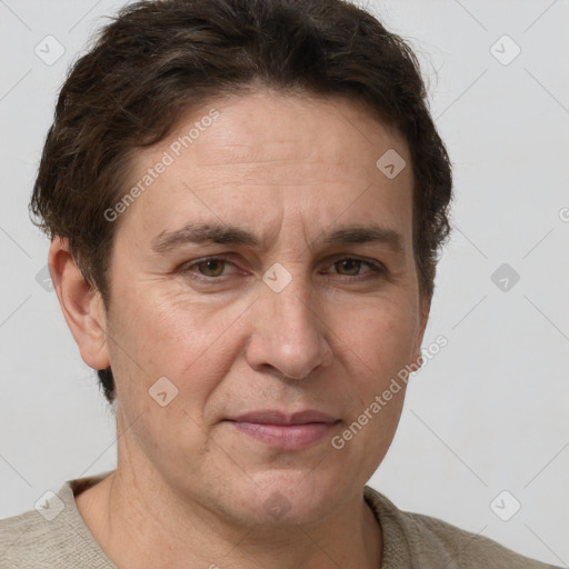 Joyful white adult male with short  brown hair and grey eyes