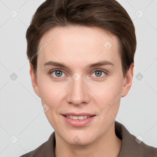 Joyful white young-adult female with short  brown hair and grey eyes