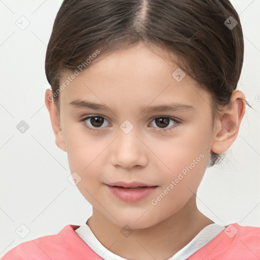 Joyful white child female with short  brown hair and brown eyes