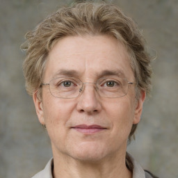 Joyful white middle-aged male with short  brown hair and brown eyes