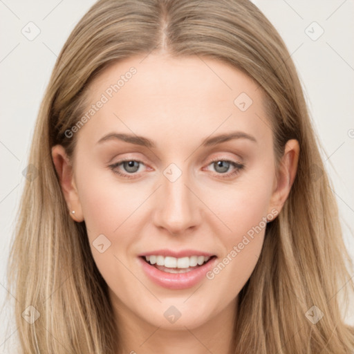 Joyful white young-adult female with long  brown hair and blue eyes