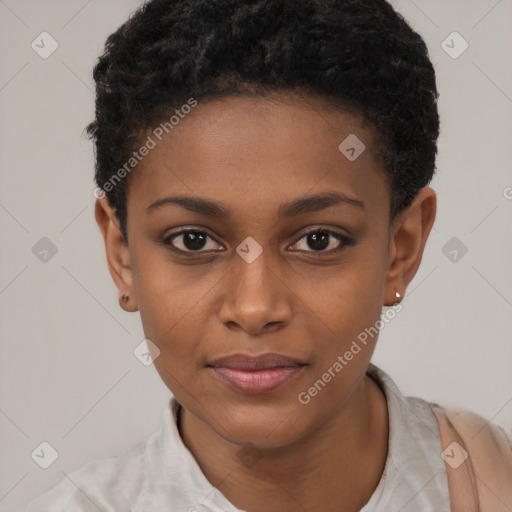 Joyful black young-adult female with short  black hair and brown eyes