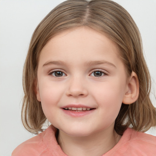 Joyful white child female with medium  brown hair and grey eyes