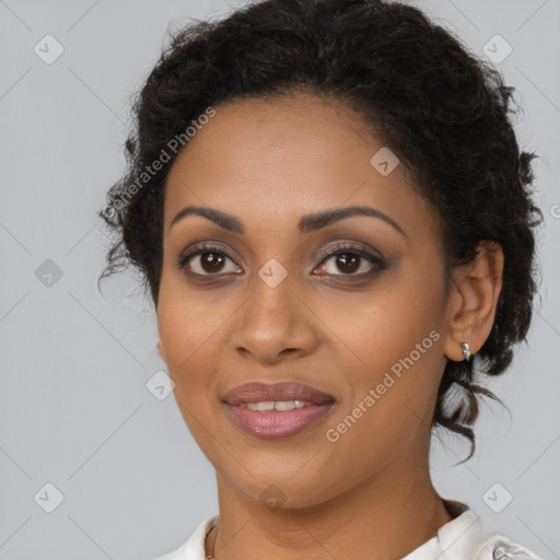 Joyful black young-adult female with medium  brown hair and brown eyes