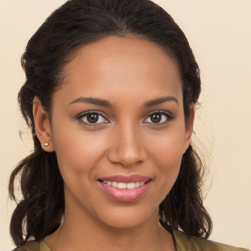 Joyful white young-adult female with long  brown hair and brown eyes