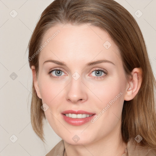 Joyful white young-adult female with long  brown hair and blue eyes