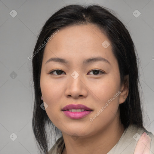 Joyful asian young-adult female with medium  black hair and brown eyes