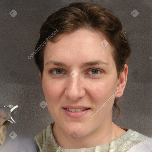 Joyful white adult female with short  brown hair and brown eyes