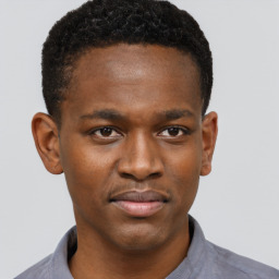 Neutral black young-adult male with short  brown hair and brown eyes