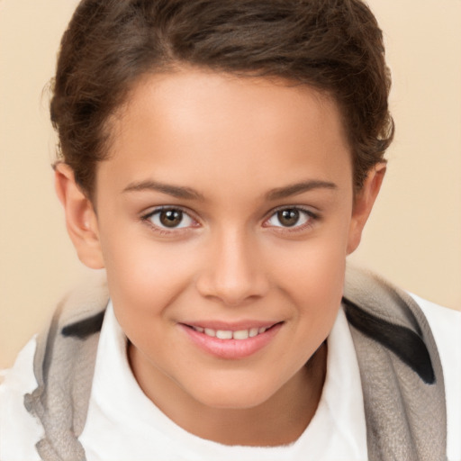 Joyful white child female with short  brown hair and brown eyes