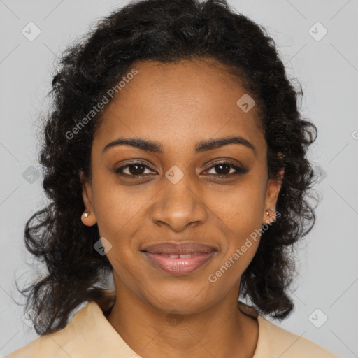 Joyful black young-adult female with long  brown hair and brown eyes