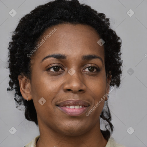 Joyful black young-adult female with medium  brown hair and brown eyes