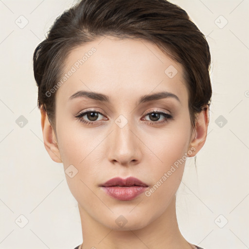 Neutral white young-adult female with medium  brown hair and brown eyes