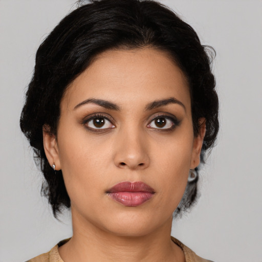 Neutral latino young-adult female with medium  black hair and brown eyes