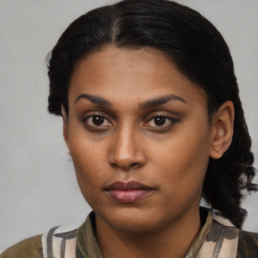 Neutral latino young-adult female with medium  brown hair and brown eyes