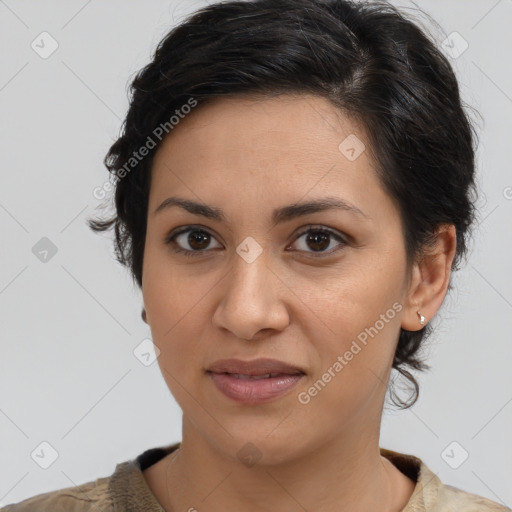 Joyful latino young-adult female with short  brown hair and brown eyes