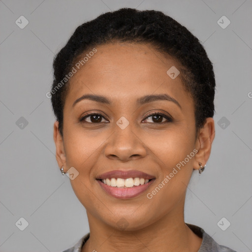 Joyful latino young-adult female with short  brown hair and brown eyes