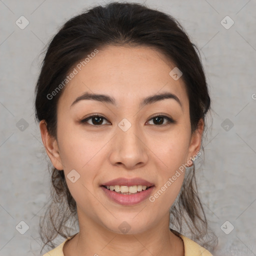 Joyful asian young-adult female with medium  brown hair and brown eyes