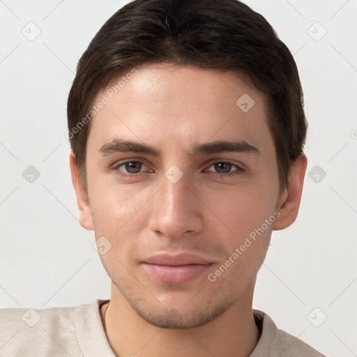 Joyful white young-adult male with short  brown hair and brown eyes