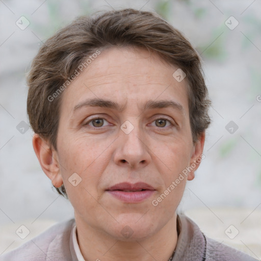 Joyful white adult female with short  brown hair and grey eyes