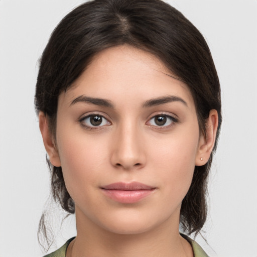 Neutral white young-adult female with medium  brown hair and brown eyes