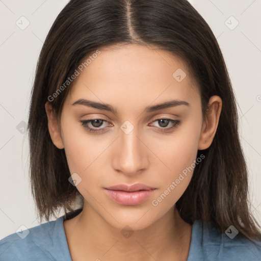 Neutral white young-adult female with long  brown hair and brown eyes