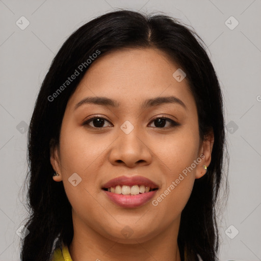 Joyful latino young-adult female with long  brown hair and brown eyes