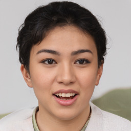 Joyful asian young-adult female with short  brown hair and brown eyes