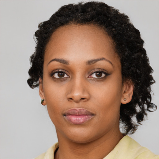 Neutral black young-adult female with long  black hair and brown eyes