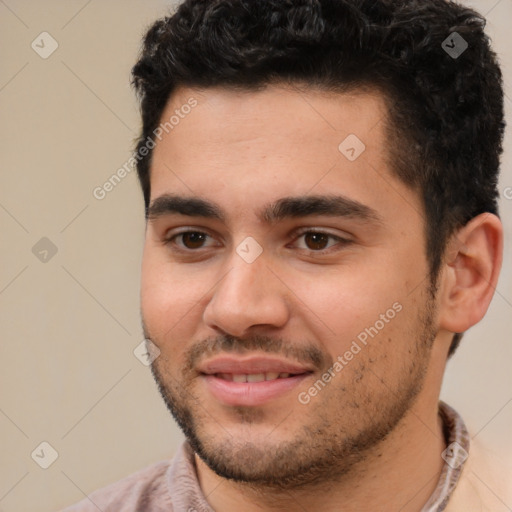 Joyful white young-adult male with short  black hair and brown eyes