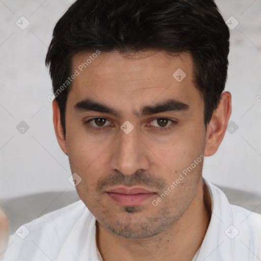 Neutral white young-adult male with short  black hair and brown eyes