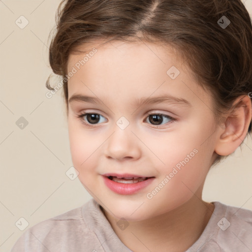 Joyful white child female with short  brown hair and brown eyes